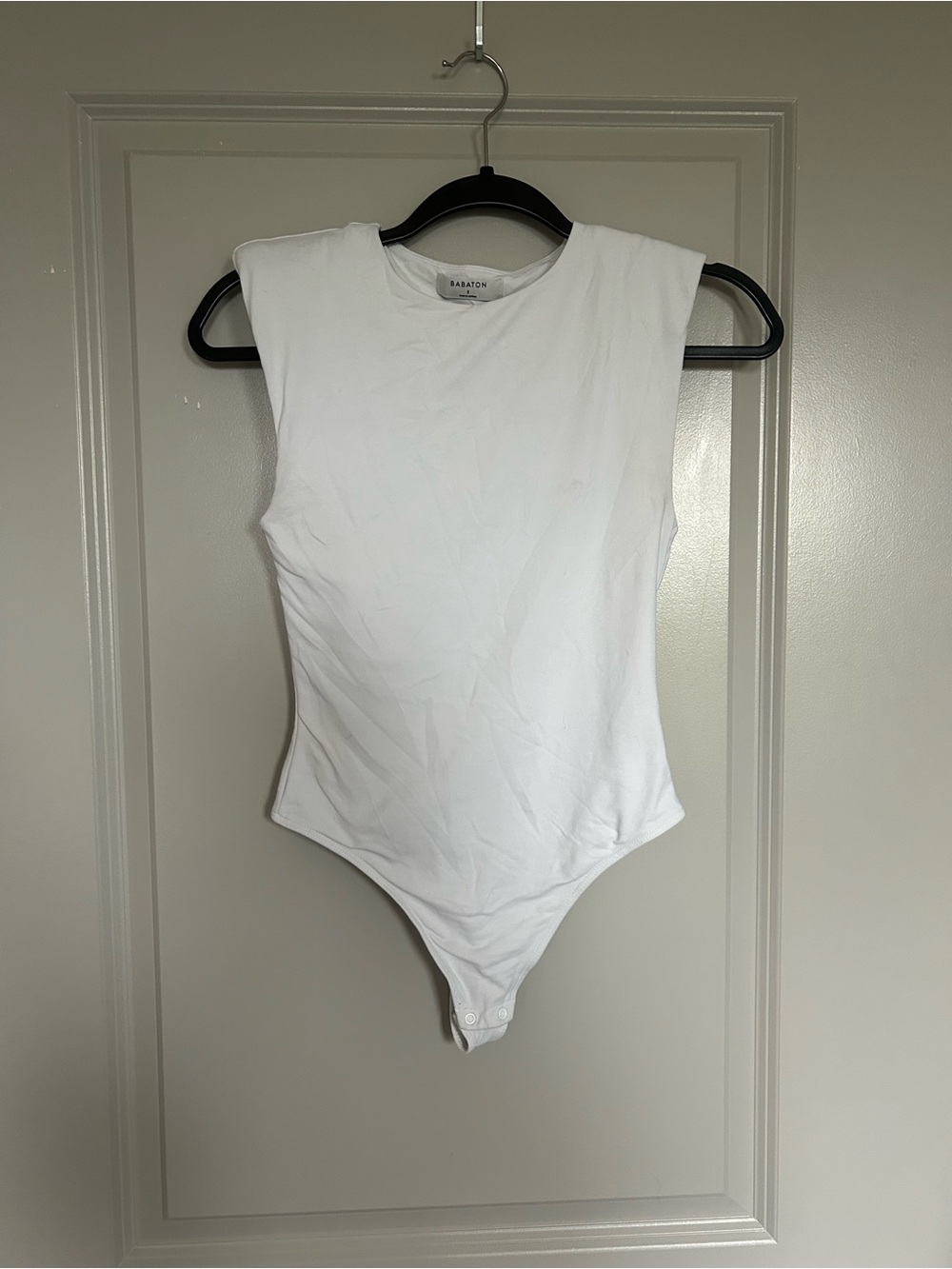 Babaton Aritzia White Padded-Shoulder Bodysuit Muscle Top
